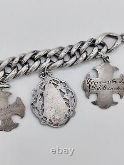 Antique charm bracelet with medals in solid silver, 19th century