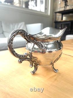 Antique cream milk pot in solid silver with Minerve hallmark 217 grams.