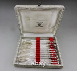 Antique dessert service 12 forks in solid silver China or Vietnam 235 grams