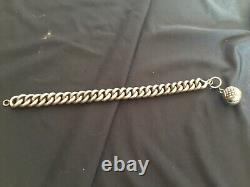 # Antique large hollow solid silver bracelet with 19th-century charm