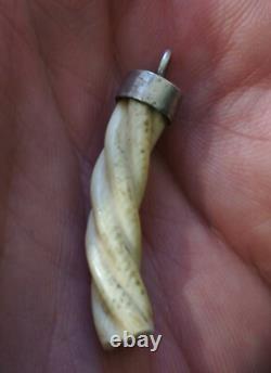 Antique pendant with a solid silver setting, to be identified