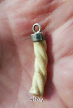 Antique pendant with a solid silver setting, to be identified