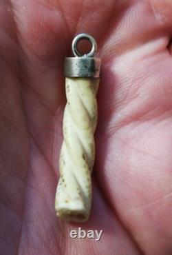 Antique pendant with a solid silver setting, to be identified