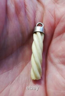 Antique pendant with a solid silver setting, to be identified