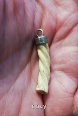 Antique pendant with a solid silver setting, to be identified