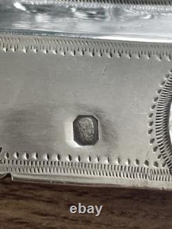 Antique pierced silver serving spoon with old man's hallmark