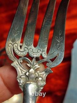 Antique silver and silver-filled dessert service in rocaille and putti style