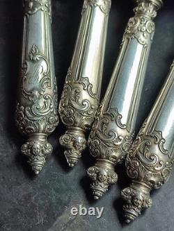 Antique silver and silver-filled dessert service in rocaille and putti style