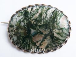 Antique silver jewelry brooch with agate, 19th century