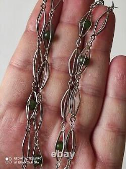 Antique silver necklace with unidentified green stones