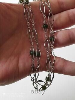 Antique silver necklace with unidentified green stones