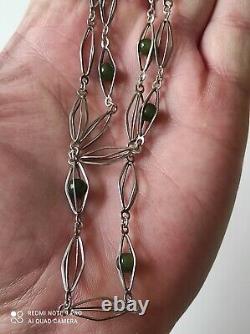 Antique silver necklace with unidentified green stones