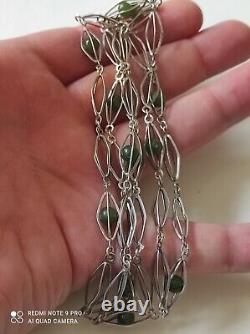 Antique silver necklace with unidentified green stones