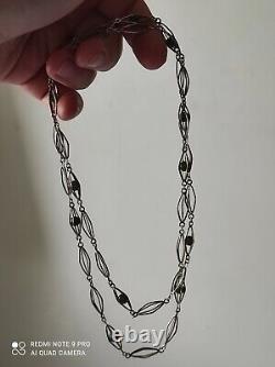 Antique silver necklace with unidentified green stones