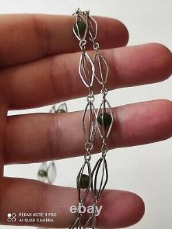 Antique silver necklace with unidentified green stones