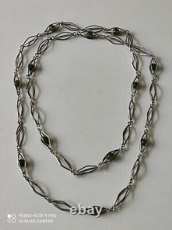 Antique silver necklace with unidentified green stones