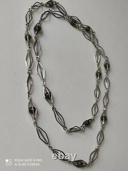 Antique silver necklace with unidentified green stones