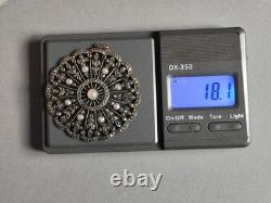 Antique silver openwork pendant in round shape set with marcasites and pearls