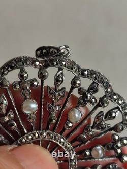 Antique silver openwork pendant in round shape set with marcasites and pearls