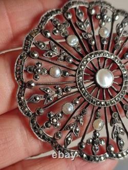 Antique silver openwork pendant in round shape set with marcasites and pearls