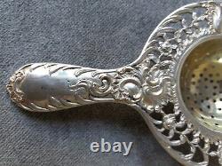 Antique solid silver and vermeil tea strainer by Johan and Kurz and Co