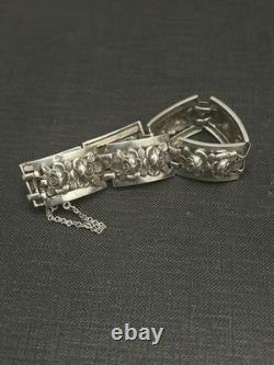 Antique solid silver bracelet with floral motif