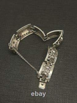 Antique solid silver bracelet with floral motif