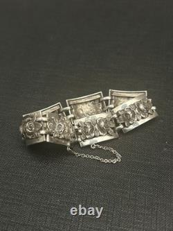 Antique solid silver bracelet with floral motif