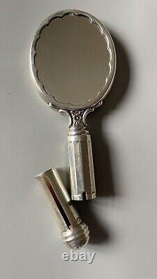 Antique solid silver hand mirror with integrated powder compact and lipstick