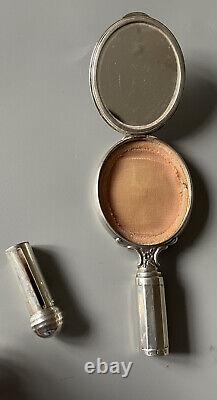 Antique solid silver hand mirror with integrated powder compact and lipstick