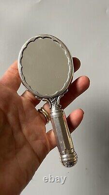 Antique solid silver hand mirror with integrated powder compact and lipstick