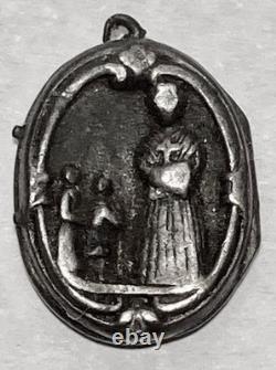 Antique solid silver reliquary medallion, early 19th century