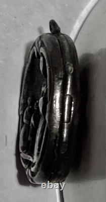 Antique solid silver reliquary medallion, early 19th century