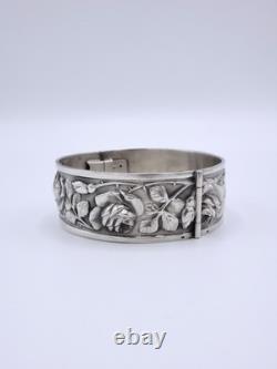 Antique sterling silver cuff bracelet with Art Nouveau rose decoration, circa 1900