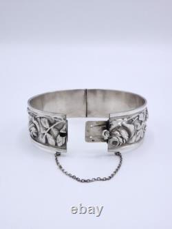 Antique sterling silver cuff bracelet with Art Nouveau rose decoration, circa 1900