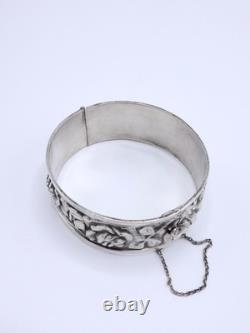Antique sterling silver cuff bracelet with Art Nouveau rose decoration, circa 1900