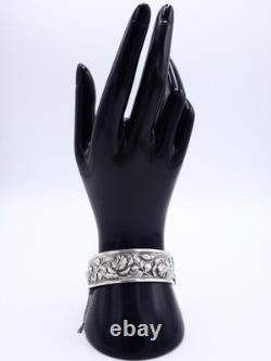 Antique sterling silver cuff bracelet with Art Nouveau rose decoration, circa 1900