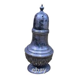 Antique vintage salt and pepper shakers in engraved solid silver