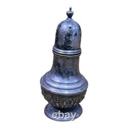 Antique vintage salt and pepper shakers in engraved solid silver