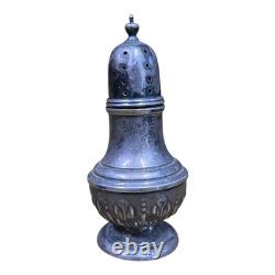 Antique vintage salt and pepper shakers in engraved solid silver