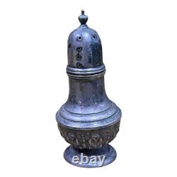 Antique vintage salt and pepper shakers in engraved solid silver