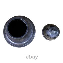 Antique vintage salt and pepper shakers in engraved solid silver