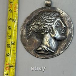 Beautiful ancient pendant in solid Greek Roman silver with image of a king