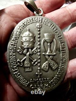 Large antique religious medallion, solid silver, stamped. 55x70mm. 55g