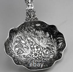 Magnificent Antique Silver Tea Strainer, richly chiseled Dutch style