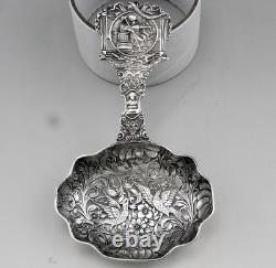 Magnificent Antique Silver Tea Strainer, richly chiseled Dutch style
