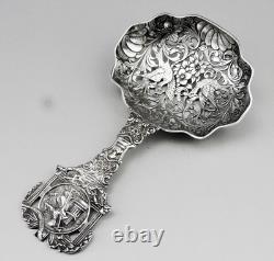 Magnificent Antique Silver Tea Strainer, richly chiseled Dutch style