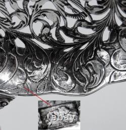 Magnificent Antique Silver Tea Strainer, richly chiseled Dutch style