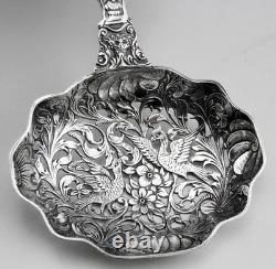 Magnificent Antique Silver Tea Strainer, richly chiseled Dutch style