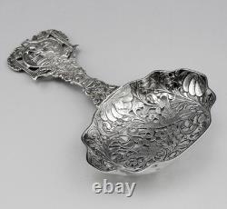 Magnificent Antique Silver Tea Strainer, richly chiseled Dutch style